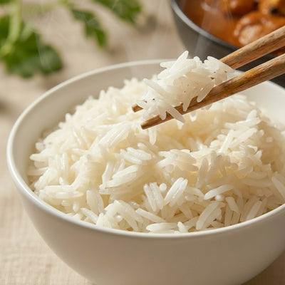 Cooked long-grain basmathi rice in a white bowl